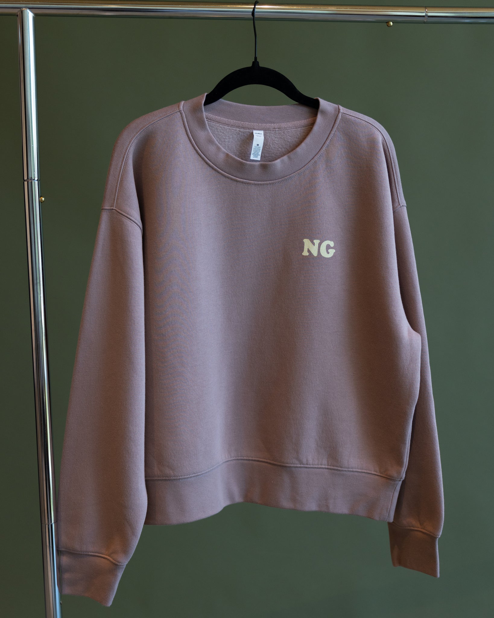 Hazy Pink Love Never Fails Crewneck (Women's Cut)