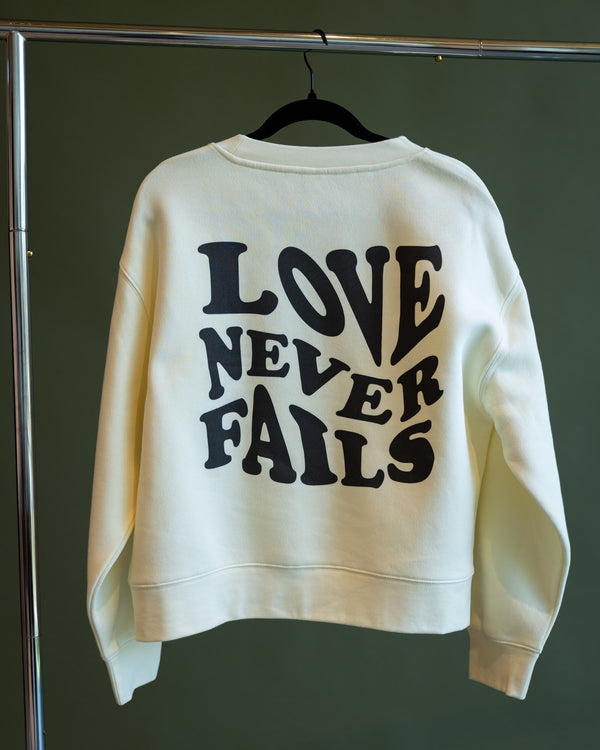 Cream Love Never Fails Crewneck (Women's Cut)